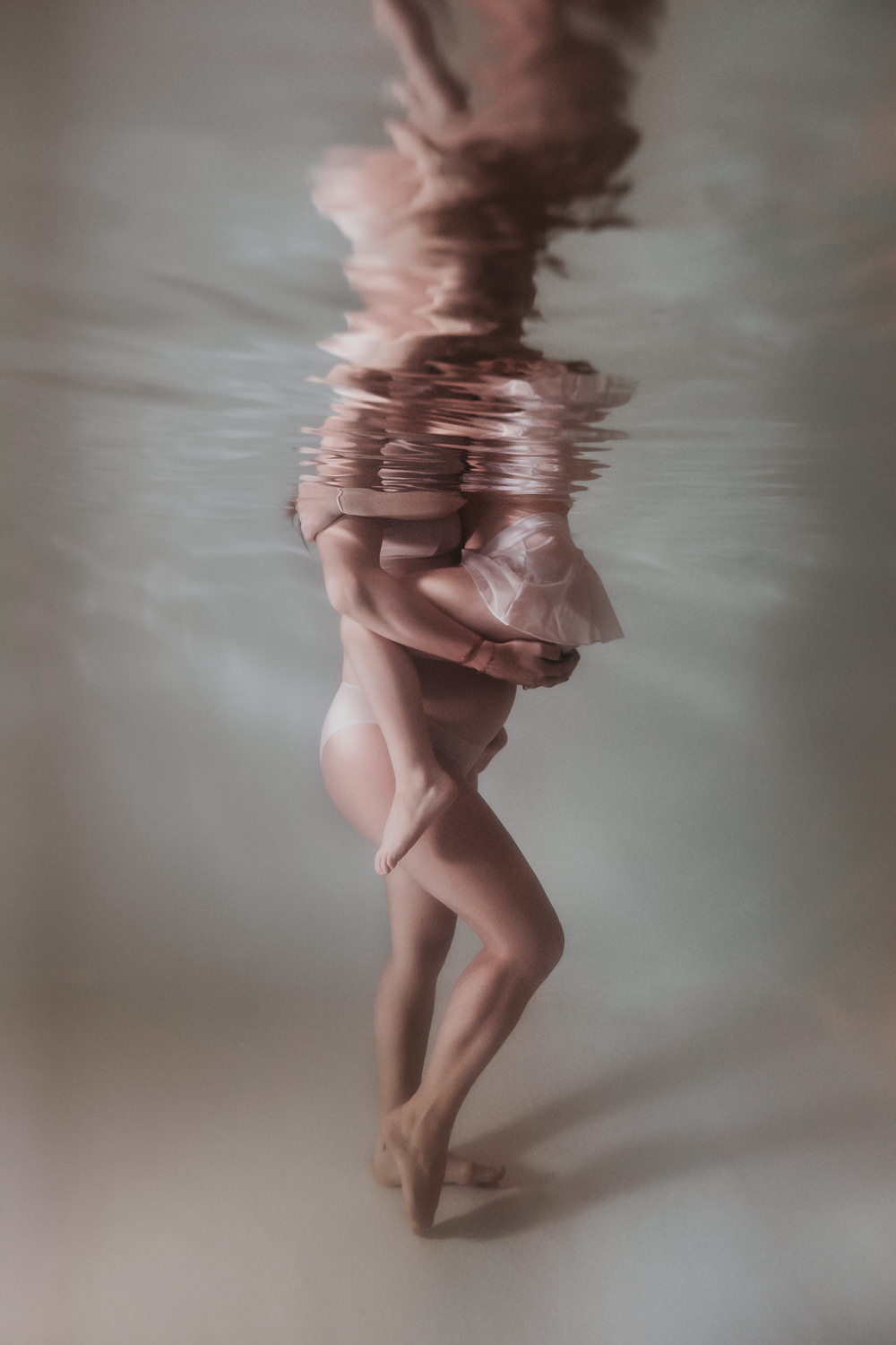 Photographe grossesse et famille dans l'eau