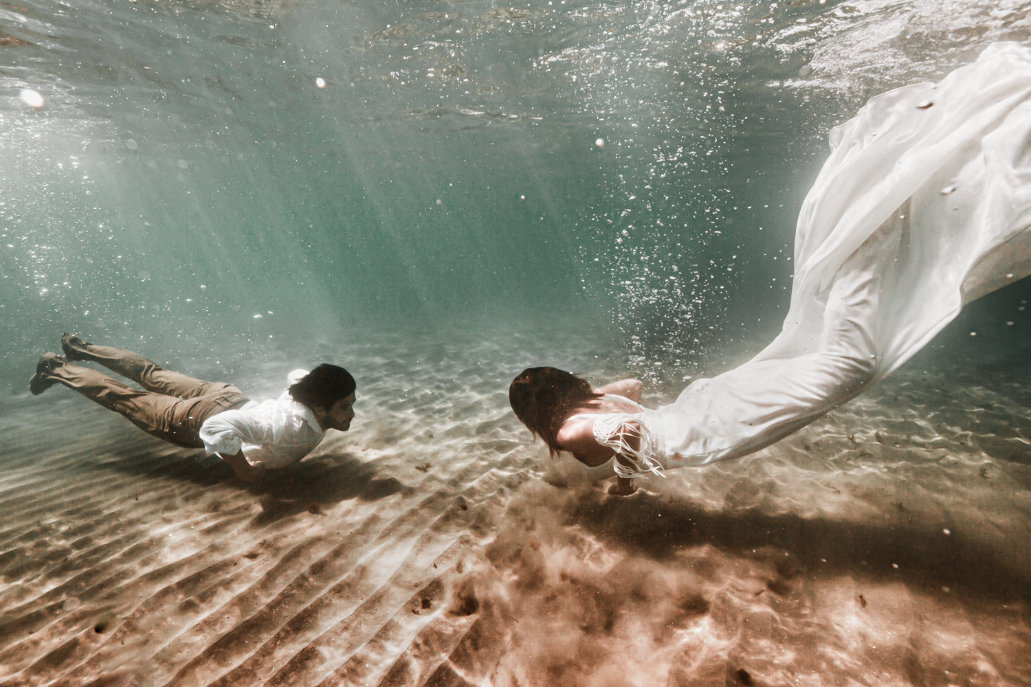 Photographe couple underwater