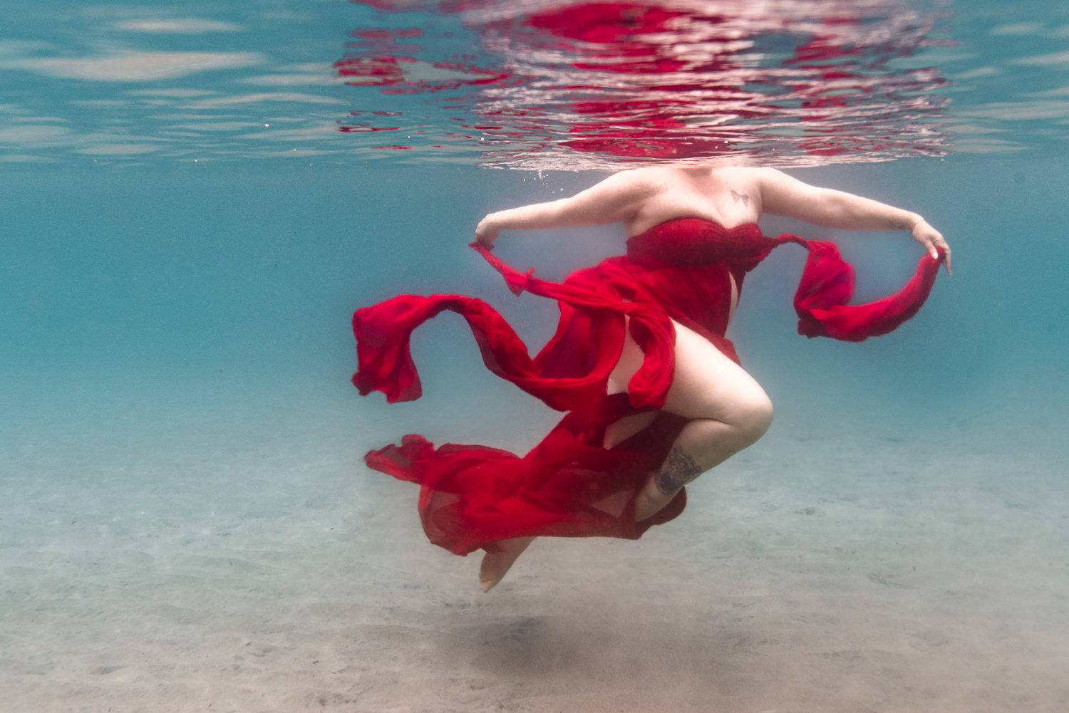Séance photo femme dans l'eau